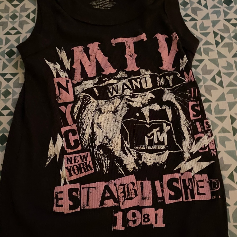 black tank top with pink grunge detail.
